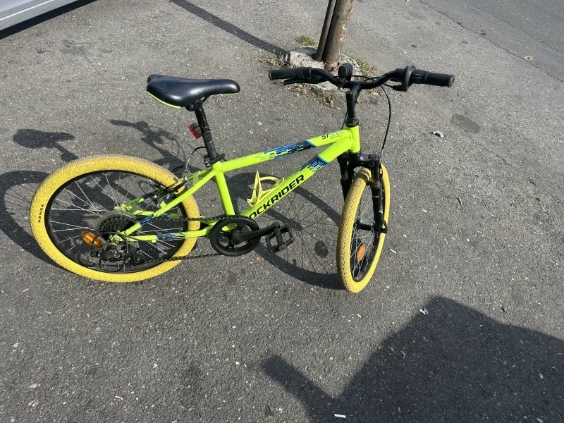 imagine 2  pentru anuntul Bicicleta Rockrider ST500 roti 20", cauciucuri galbene, stare f buna